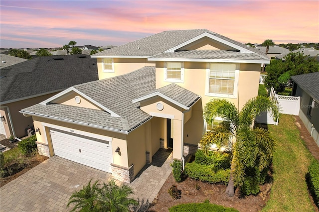 view of front of property with a garage