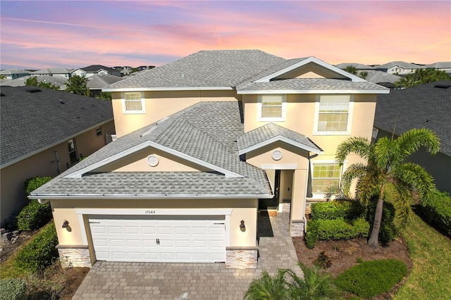 view of front of house with a garage