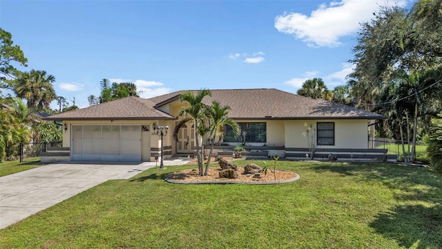 single story home with a garage and a front yard