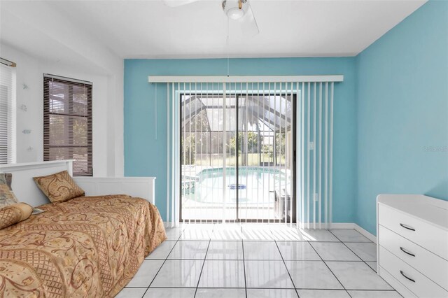 tiled bedroom featuring access to outside and ceiling fan