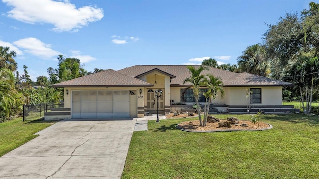 ranch-style home with a garage and a front yard