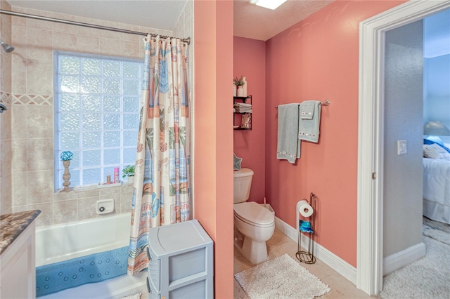 full bathroom with toilet, tile patterned floors, shower / tub combo with curtain, vanity, and a textured ceiling