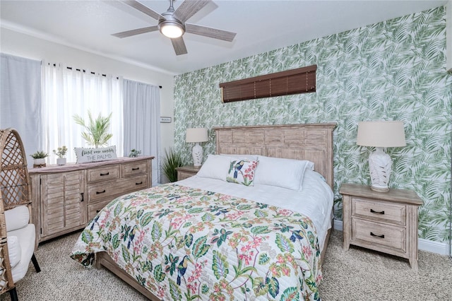 bedroom with ceiling fan and light carpet