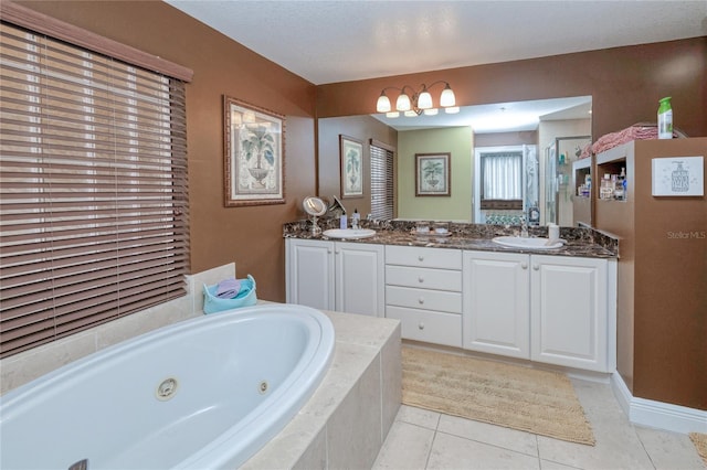 bathroom featuring vanity, plus walk in shower, and tile patterned flooring