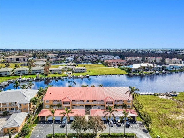 bird's eye view with a water view