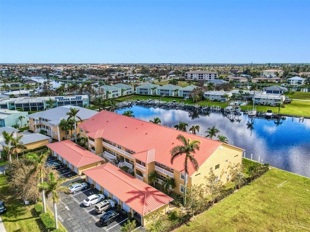 drone / aerial view with a water view