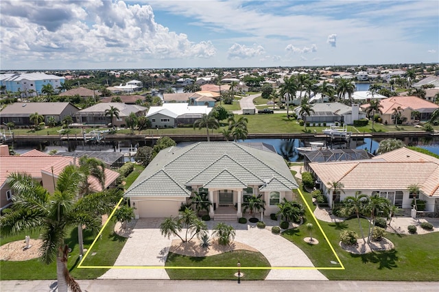 drone / aerial view featuring a water view