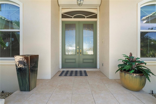 entrance to property featuring french doors