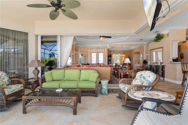 interior space with ceiling fan with notable chandelier