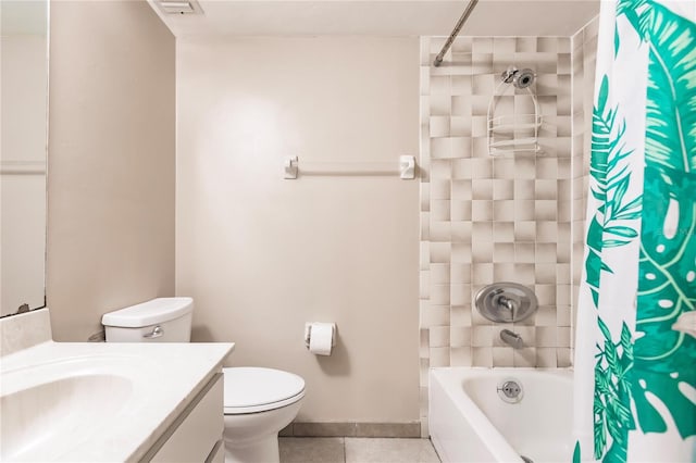 full bathroom with tile patterned floors, shower / bath combo, vanity, and toilet