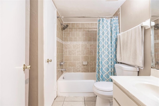 full bathroom with tile patterned flooring, shower / tub combo, vanity, and toilet