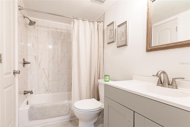 full bathroom with vanity, toilet, and shower / tub combo with curtain