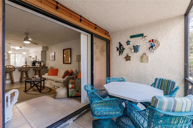 view of patio with ceiling fan