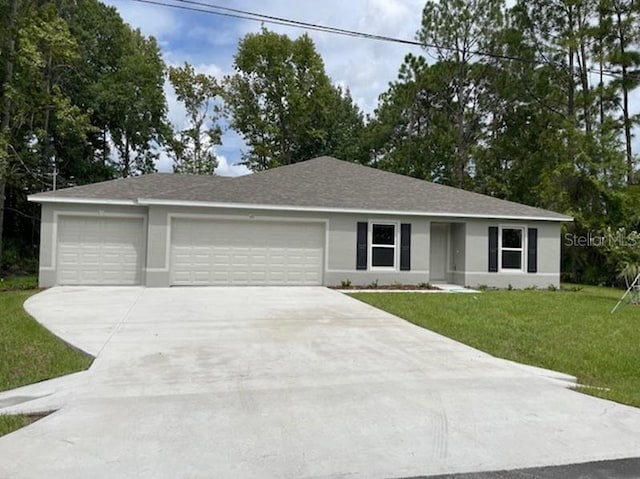 single story home featuring a front lawn and a garage