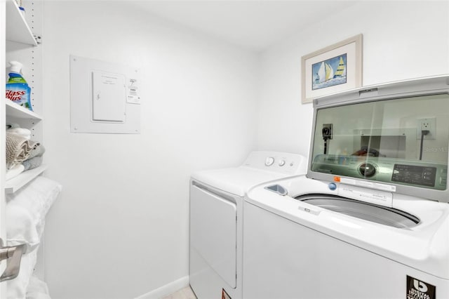 washroom with washer and dryer