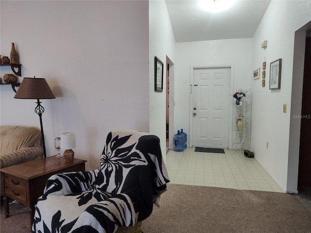 entryway with light carpet