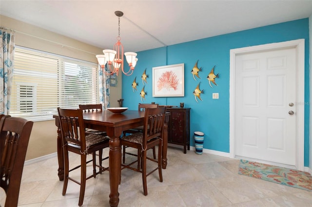 dining area featuring a chandelier