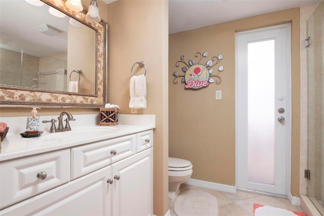 bathroom featuring walk in shower, vanity, toilet, and tile patterned floors