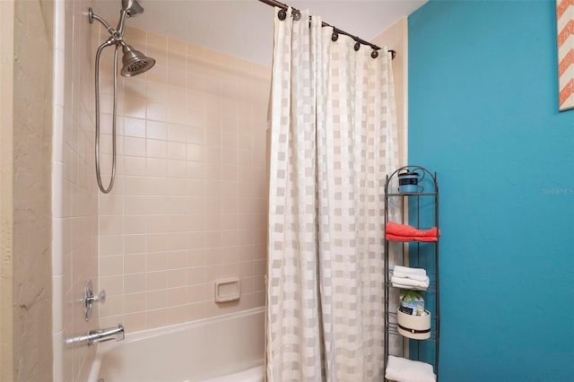 bathroom with shower / bath combo