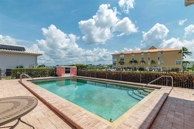 view of pool with a patio