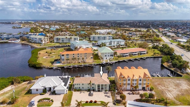 bird's eye view with a water view