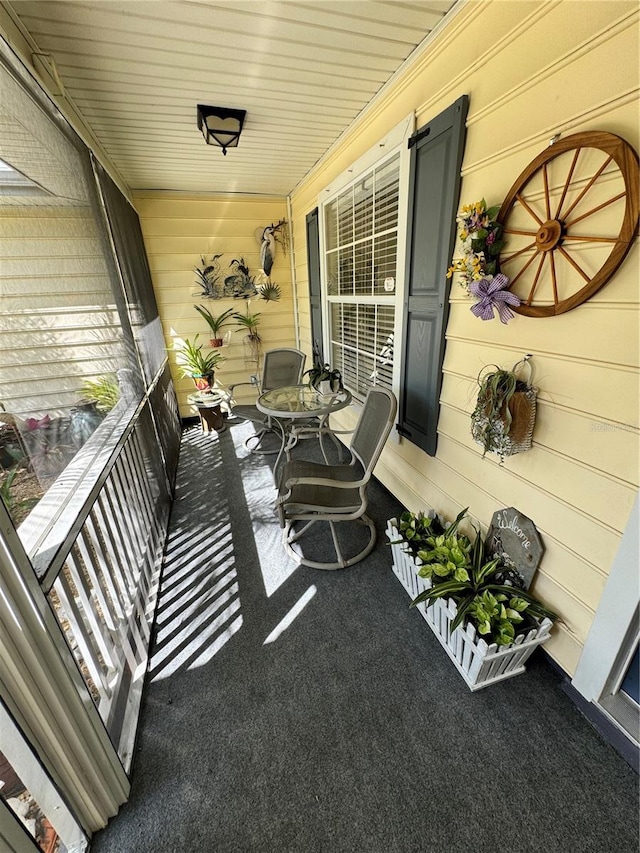 balcony featuring a porch