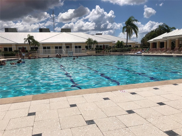 view of swimming pool featuring a patio area