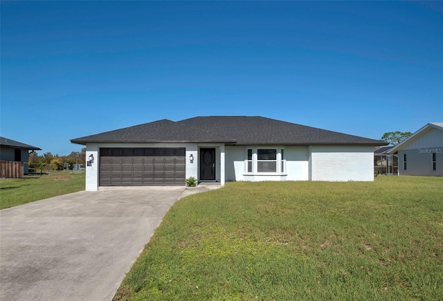 view of front of property with an attached garage, driveway, a front lawn, and brick siding