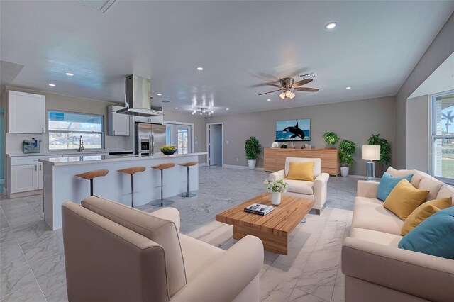 living area with marble finish floor, recessed lighting, a ceiling fan, baseboards, and visible vents