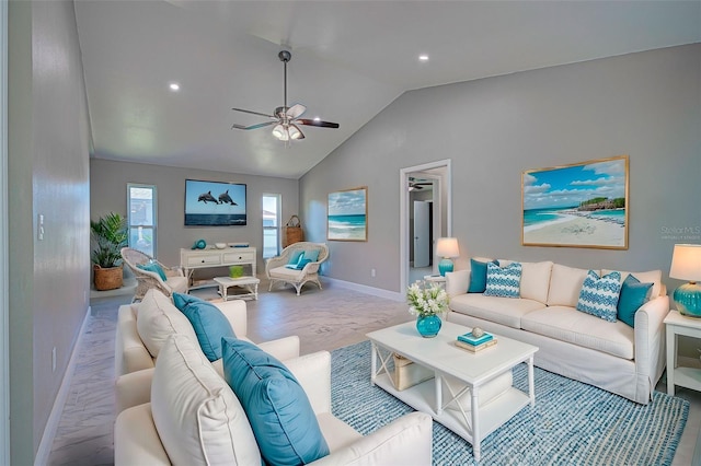 living room featuring lofted ceiling, ceiling fan, and light hardwood / wood-style floors