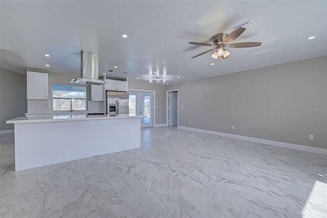 unfurnished living room with ceiling fan, french doors, recessed lighting, baseboards, and visible vents