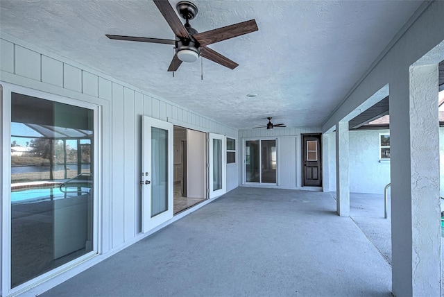 view of patio featuring a ceiling fan