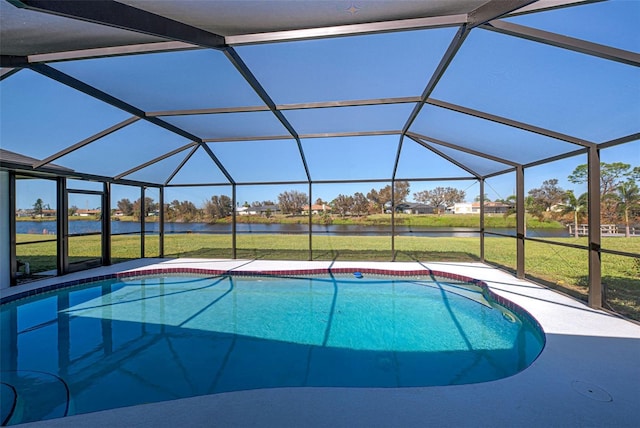 view of pool featuring a water view, a yard, and a lanai