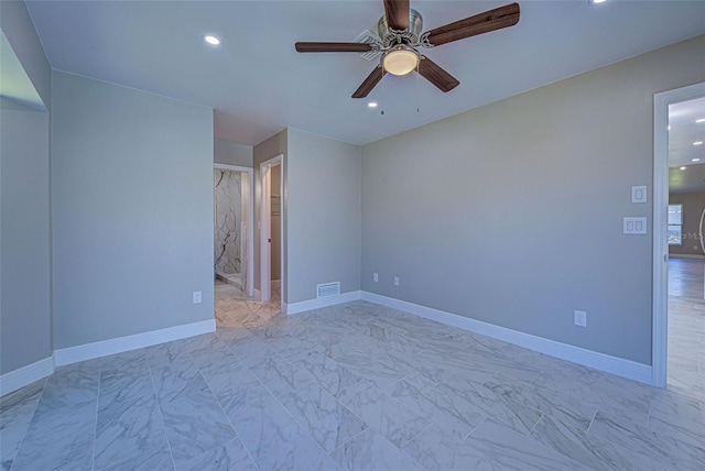 spare room with ceiling fan