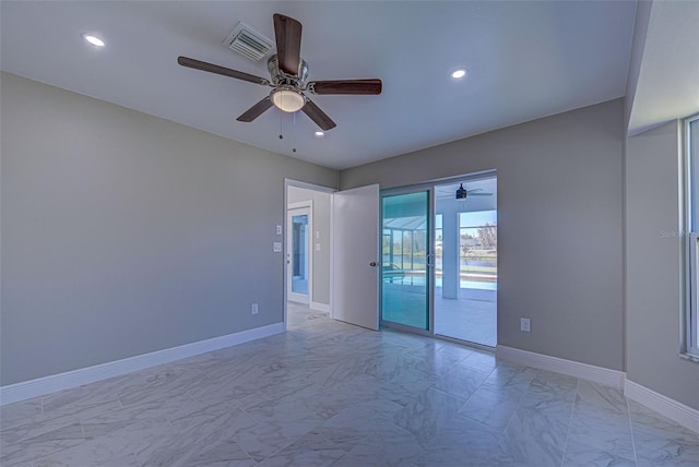 spare room with visible vents, a ceiling fan, marble finish floor, and recessed lighting