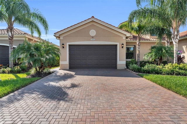 view of front of property with a garage