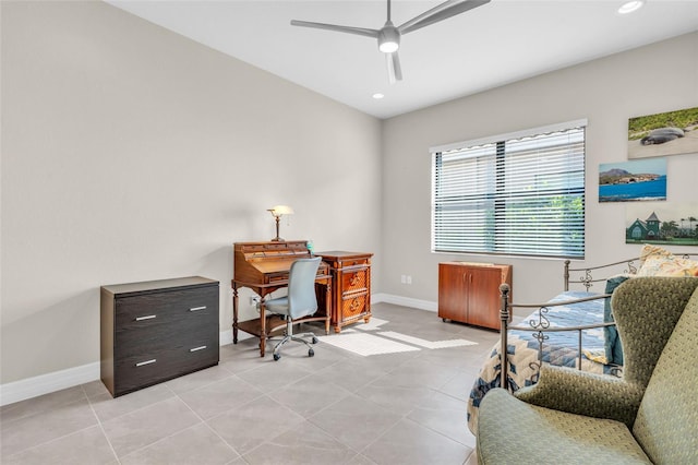 office space featuring ceiling fan and light tile patterned floors