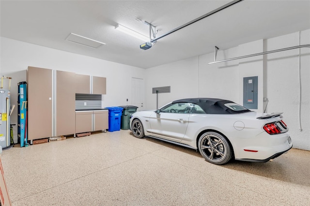 garage with a garage door opener, water heater, and electric panel