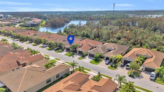 drone / aerial view featuring a water view