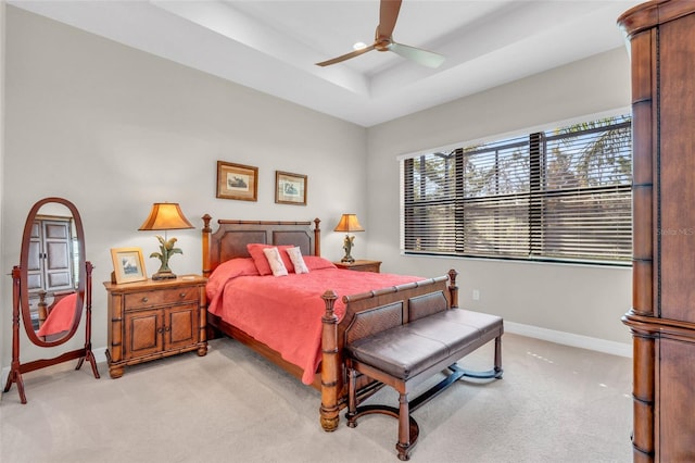 bedroom featuring ceiling fan and light colored carpet