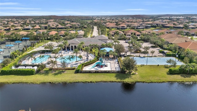 drone / aerial view with a water view