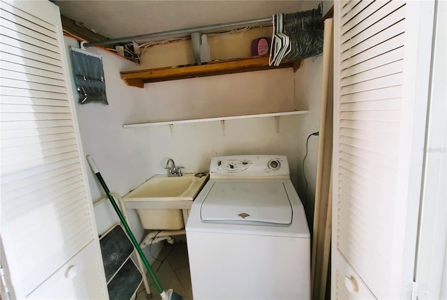 laundry room featuring washer / dryer and sink