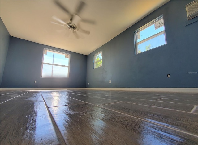 spare room featuring ceiling fan and lofted ceiling