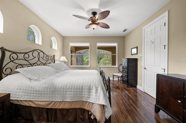 bedroom featuring dark hardwood / wood-style floors and ceiling fan