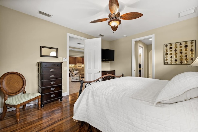 bedroom featuring ceiling fan and dark hardwood / wood-style flooring