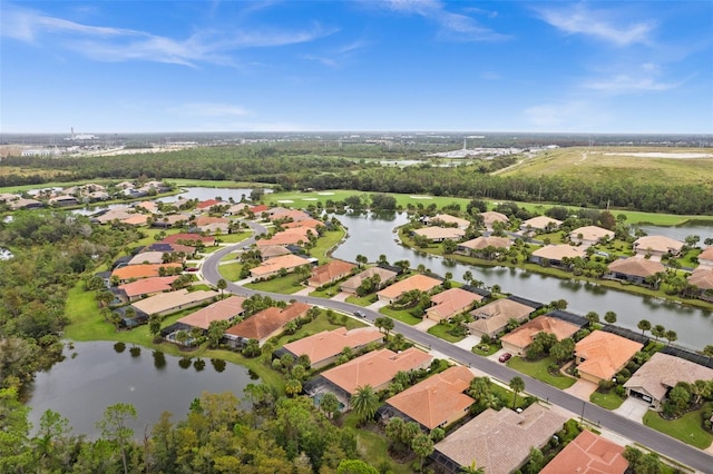 bird's eye view with a water view