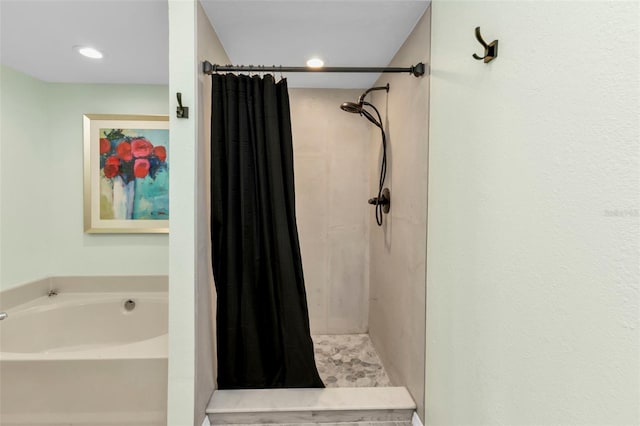 bathroom with independent shower and bath