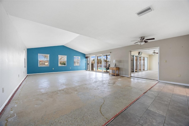 unfurnished living room featuring lofted ceiling, concrete floors, and ceiling fan