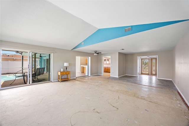 unfurnished living room featuring lofted ceiling and ceiling fan