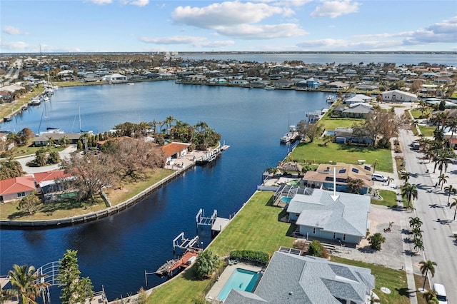 drone / aerial view featuring a water view